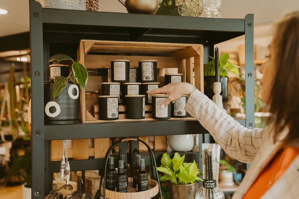Natalie arranging a display at INSIDE